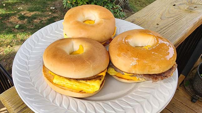 Three McDonald's breakfast bagels on a plate